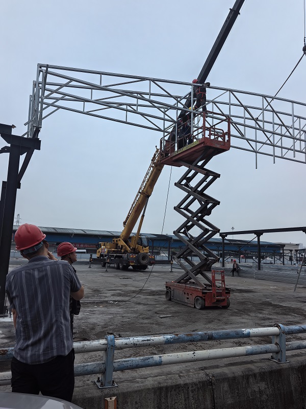 深耕户外篷体工程领域 好工金属大型电动篷项目落地国际农贸城